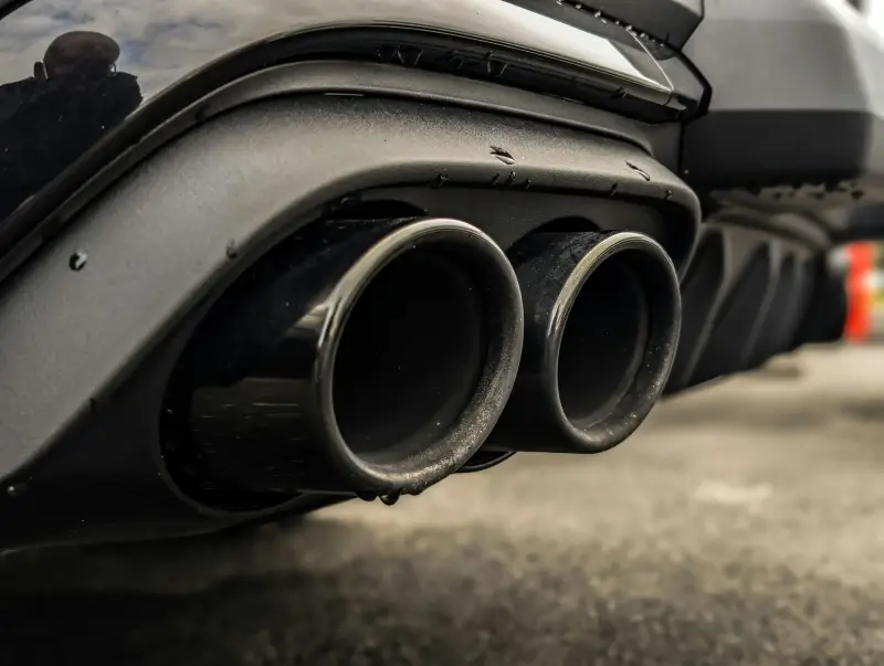 Close-up of a vehicle’s exhaust tailpipes